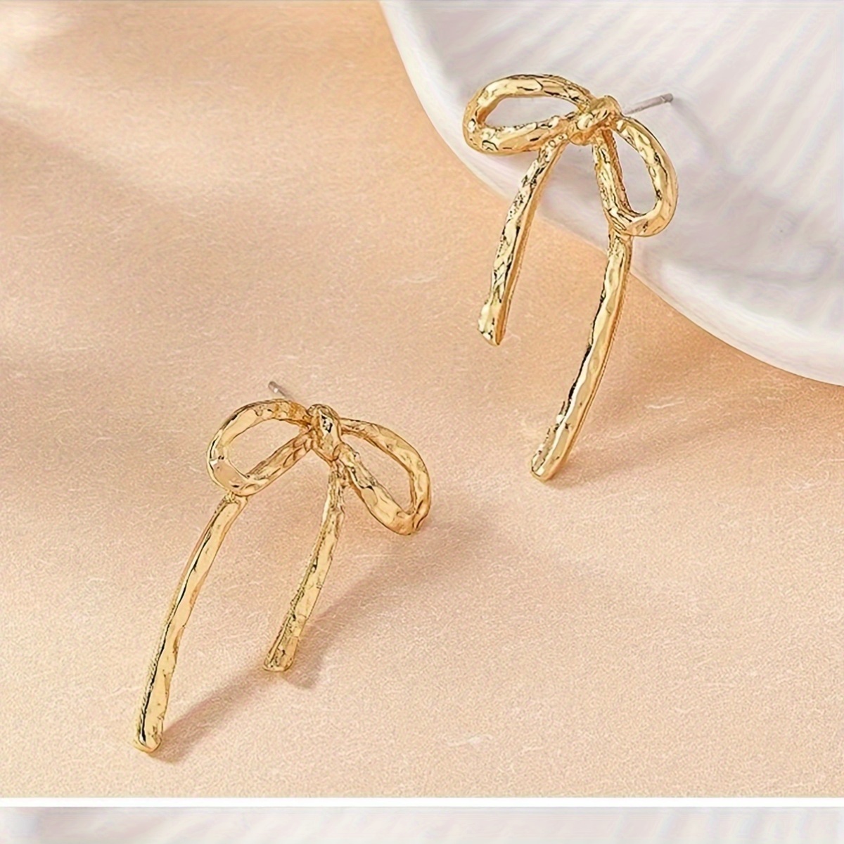 Hollow-Out Large Bow Stud Earrings
